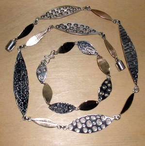 Etched silver and gold necklace and bracelet